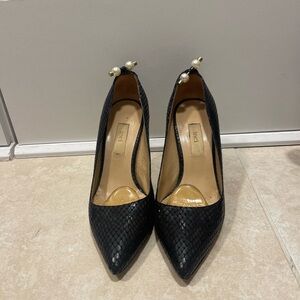 Black stilettos with pearl detail